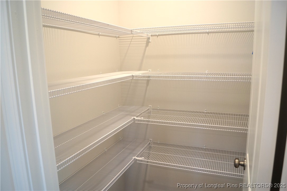 174 Nectar Lane Bunnlevel, NC 28323 - Photo 12 of 41 a view of an empty walk in closet