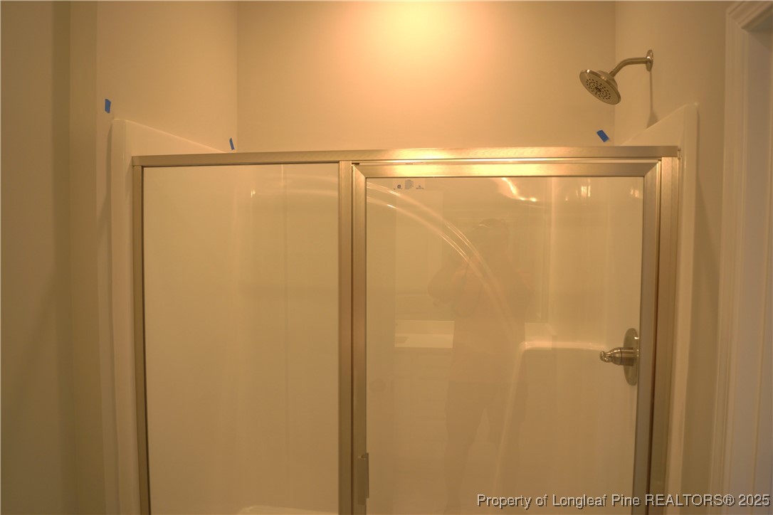 174 Nectar Lane Bunnlevel, NC 28323 - Photo 25 of 41 a bathroom with a shower