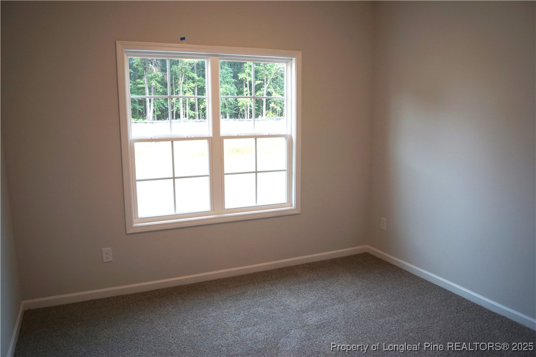 174 Nectar Lane Bunnlevel, NC 28323 - Photo 28 of 41 an empty room with a window