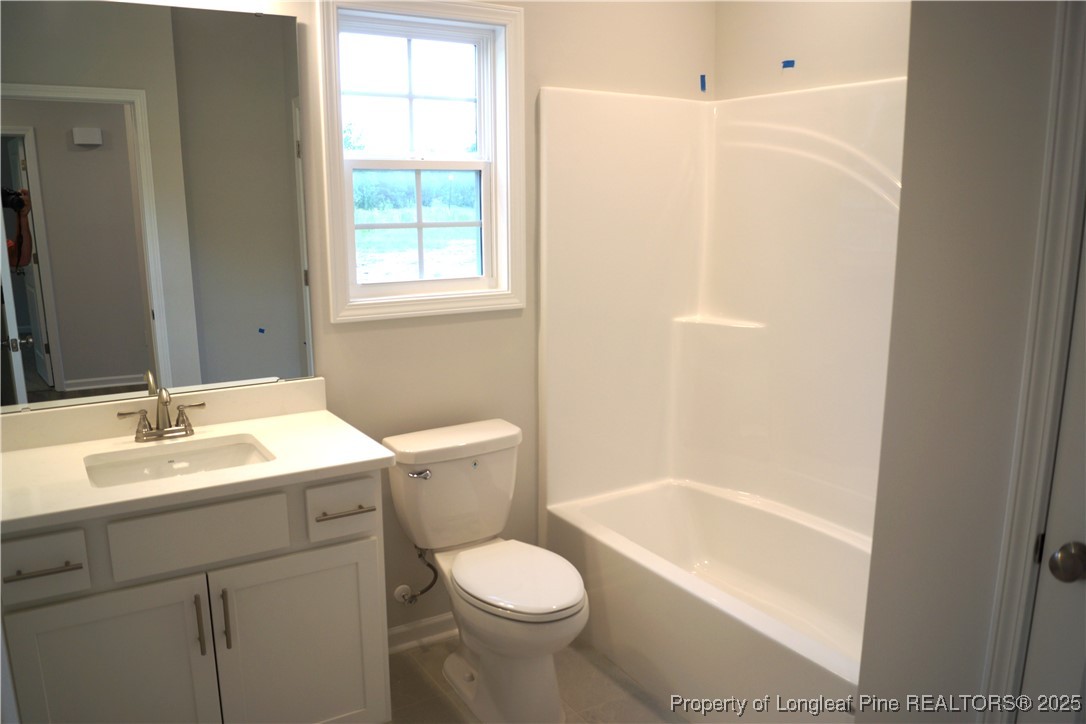 174 Nectar Lane Bunnlevel, NC 28323 - Photo 31 of 41 a bathroom with a sink toilet and shower