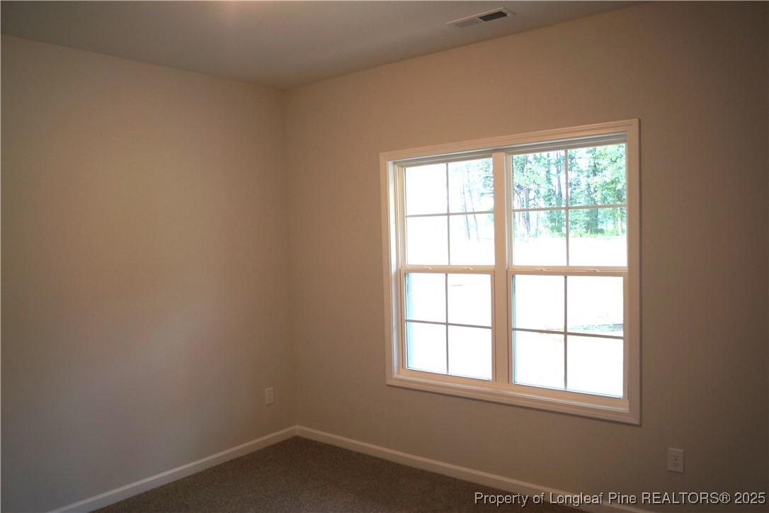 174 Nectar Lane Bunnlevel, NC 28323 - Photo 32 of 41 an empty room with a window