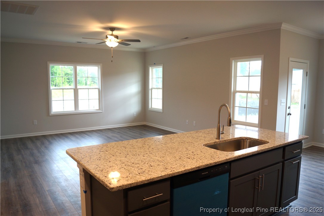 174 Nectar Lane Bunnlevel, NC 28323 - Photo 8 of 41 a bathroom with a granite countertop sink and a large mirror
