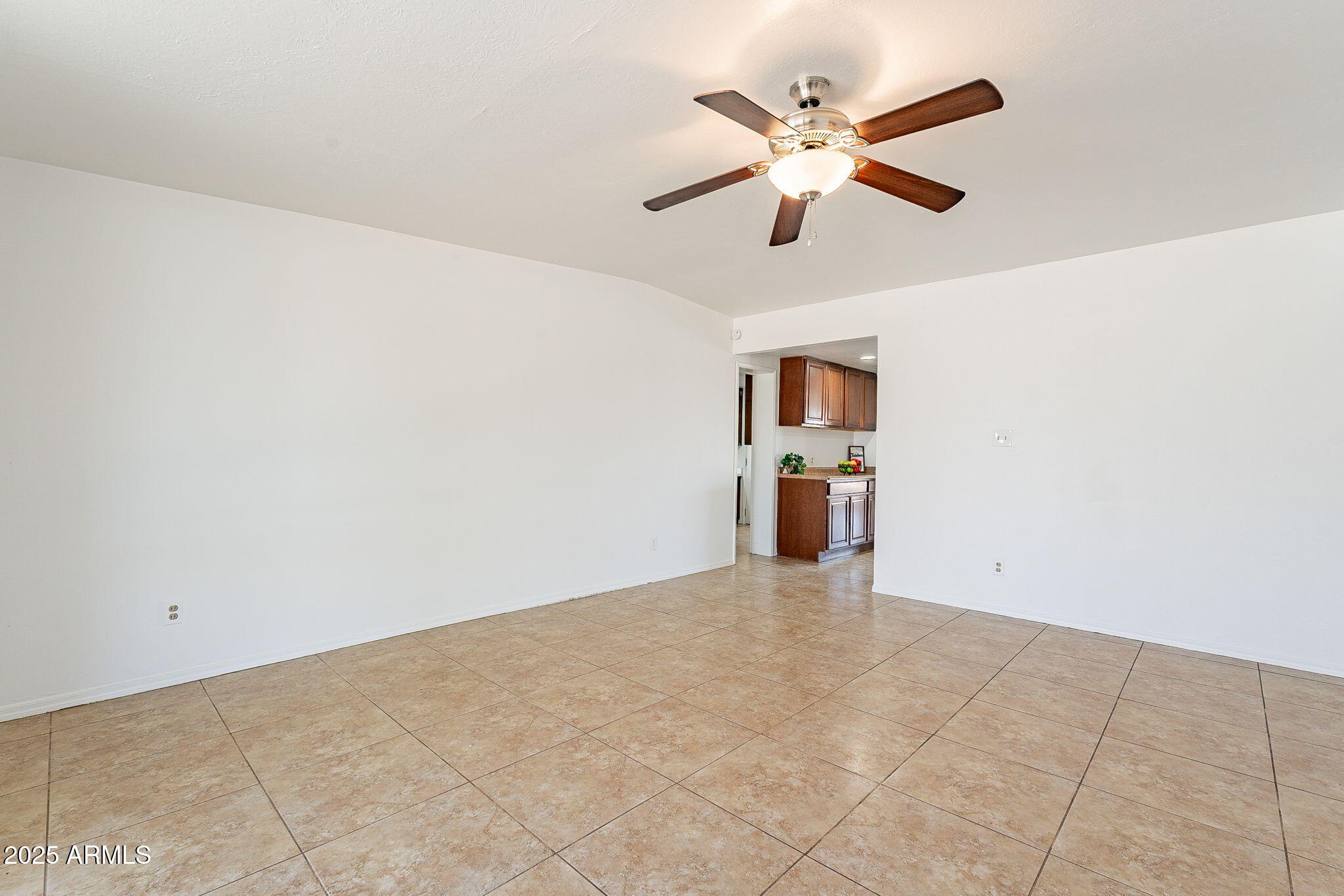 551 West Harding Avenue Coolidge, AZ 85128 - Photo 18 of 52 an empty room with closet and ceiling fan