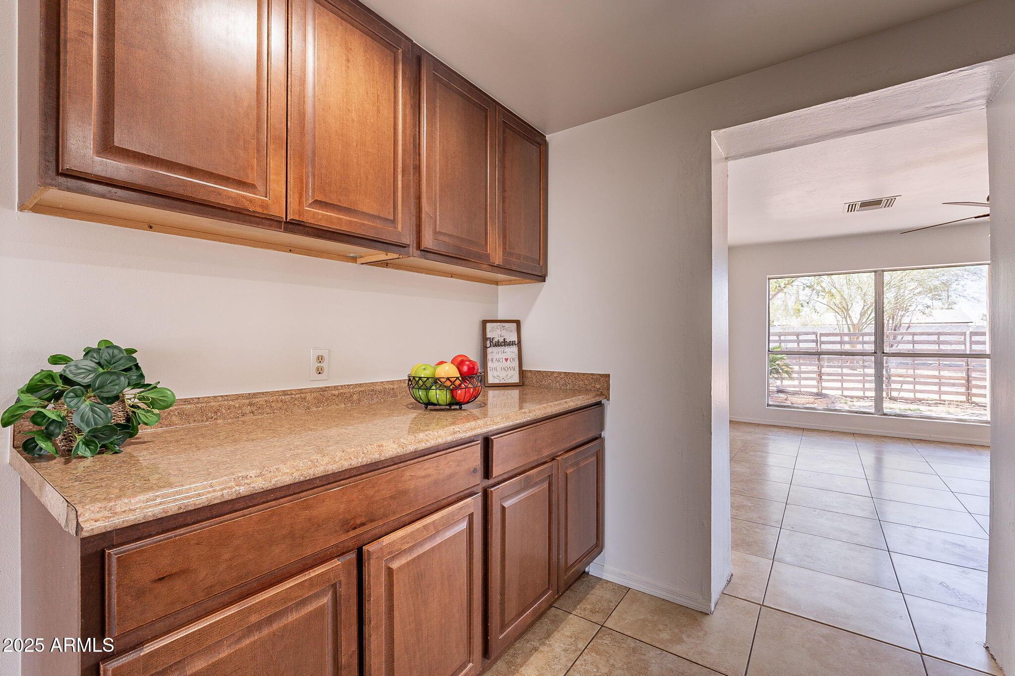 551 West Harding Avenue Coolidge, AZ 85128 - Photo 22 of 52 a kitchen with a sink and cabinets