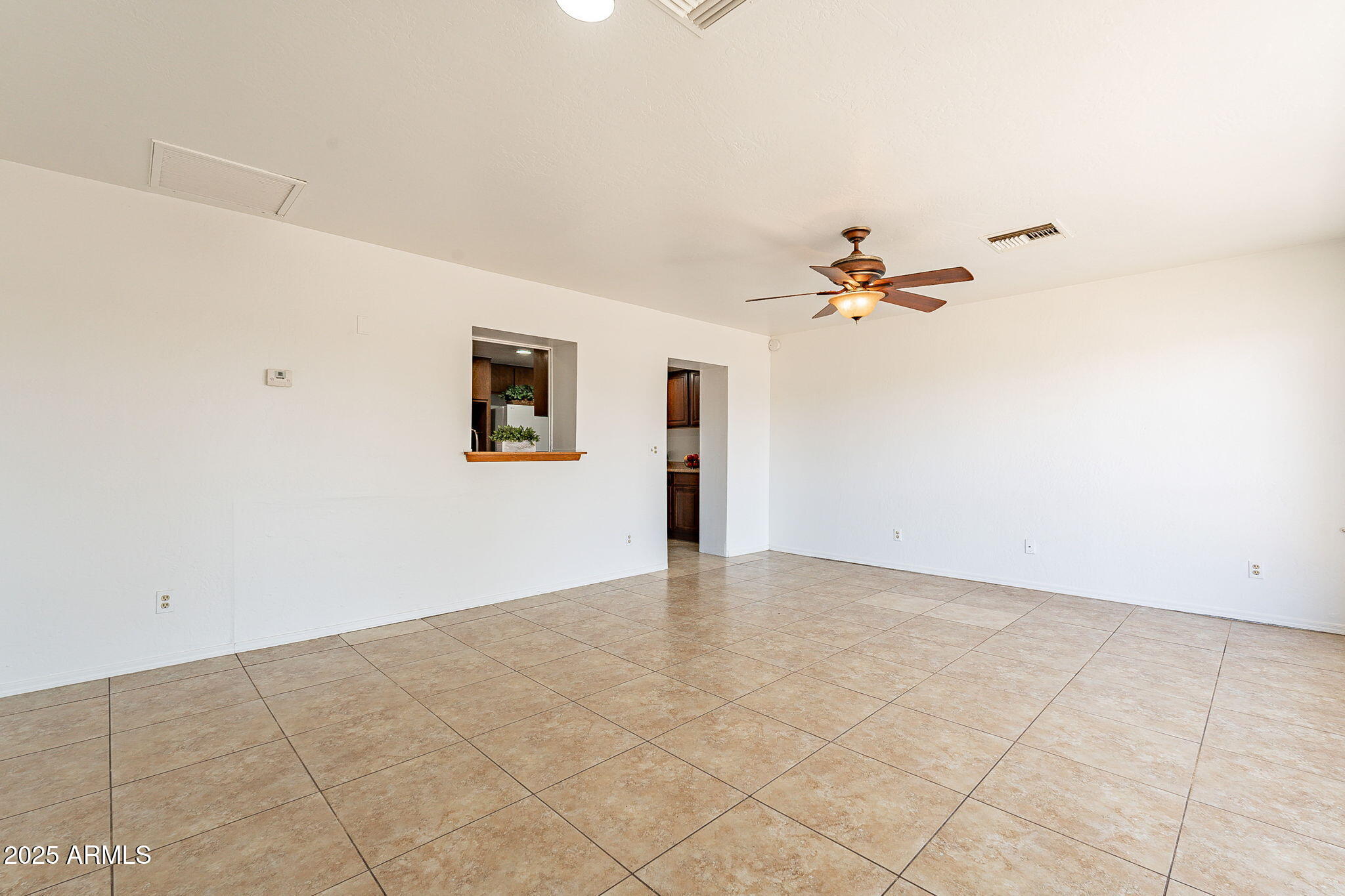 551 West Harding Avenue Coolidge, AZ 85128 - Photo 24 of 52 a view of a room with a fan