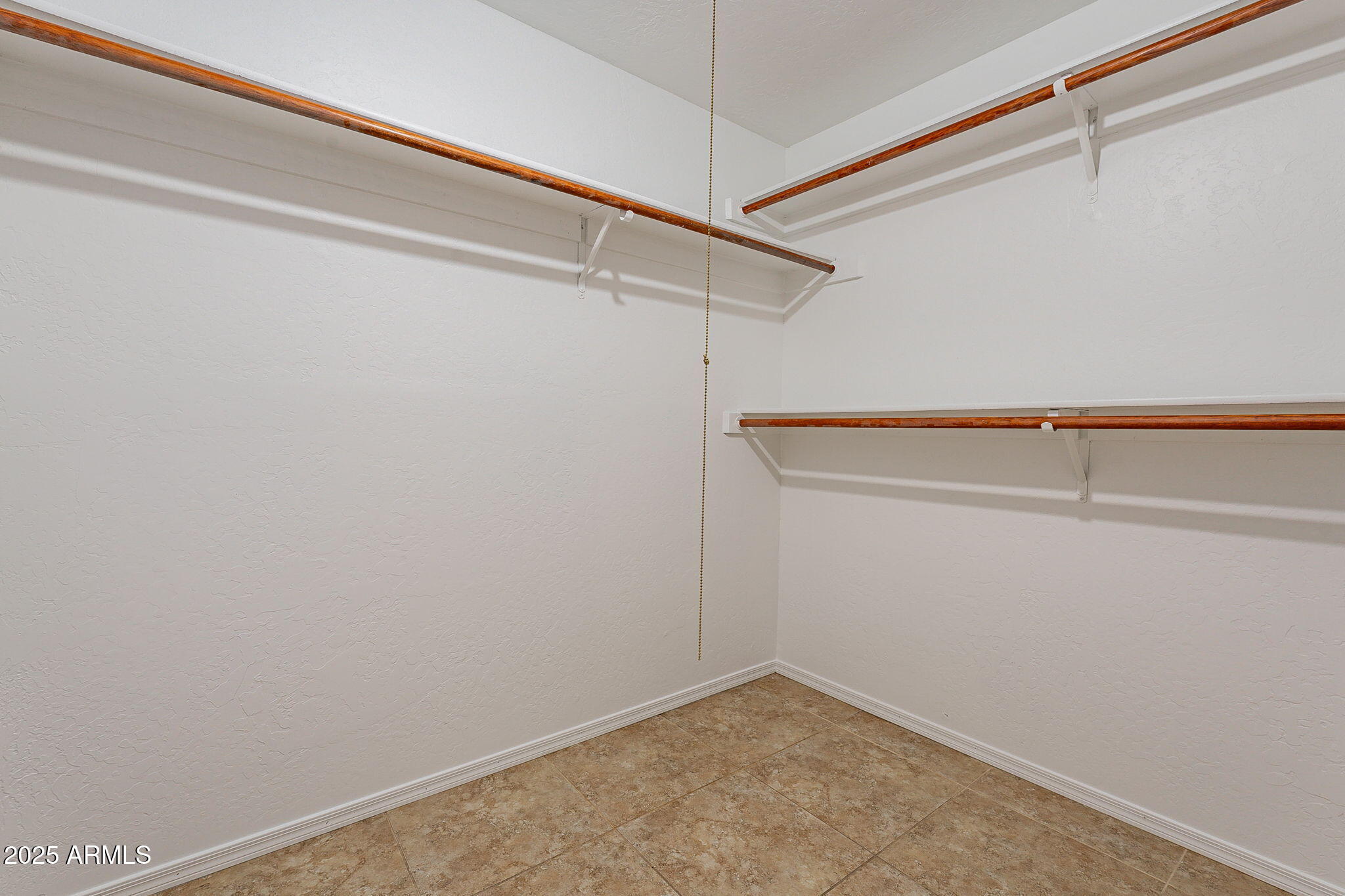 551 West Harding Avenue Coolidge, AZ 85128 - Photo 31 of 52 a view of a room with racks on the wall