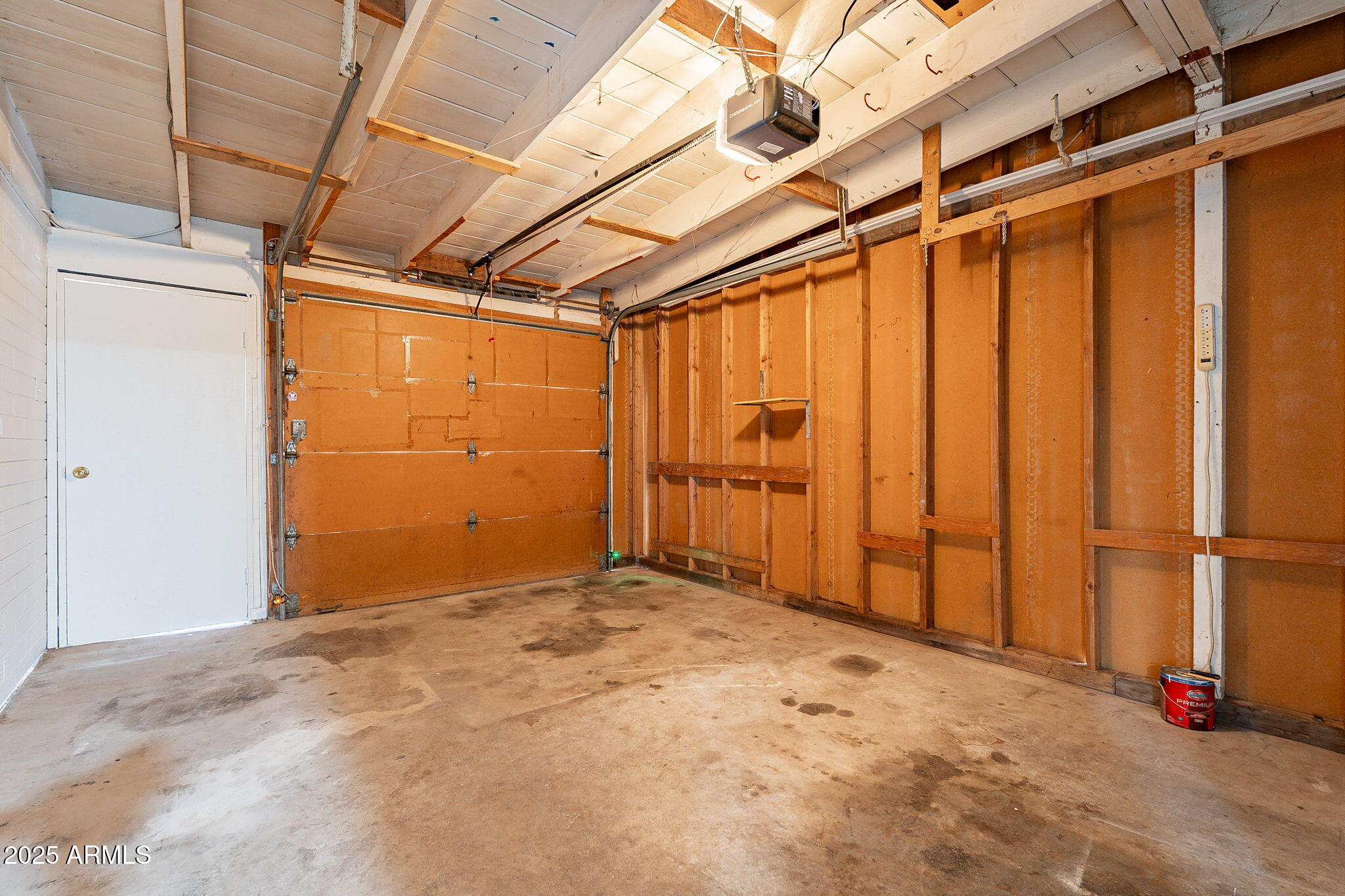 551 West Harding Avenue Coolidge, AZ 85128 - Photo 40 of 52 a view of a garage with wooden walls