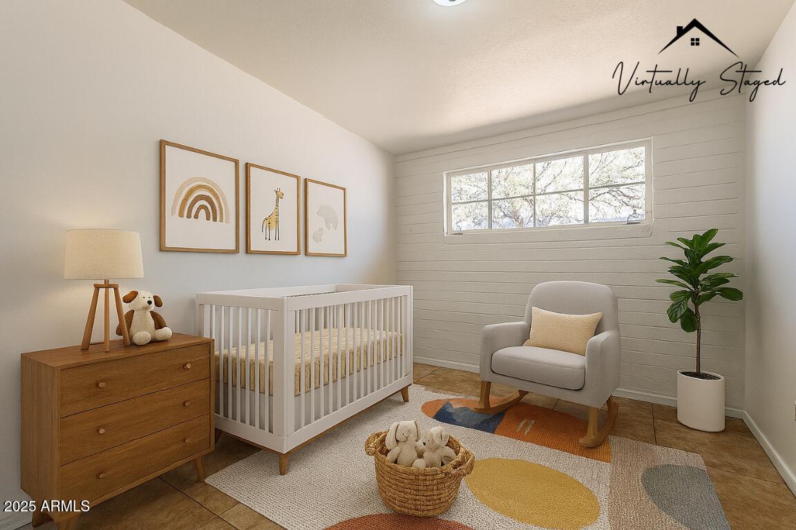 551 West Harding Avenue Coolidge, AZ 85128 - Photo 4 of 52 a bedroom with furniture and a window