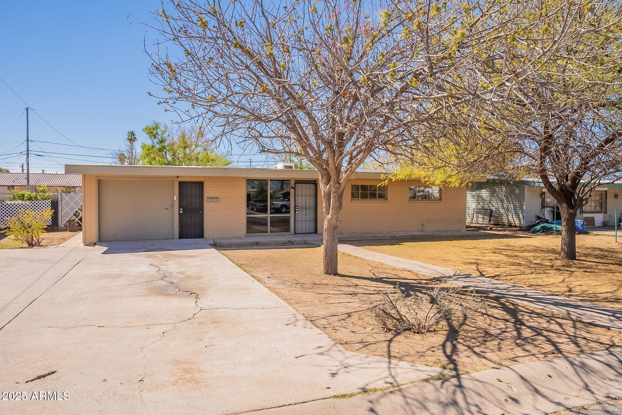 551 West Harding Avenue Coolidge, AZ 85128 - Photo 51 of 52 a view of a house with snow on the road
