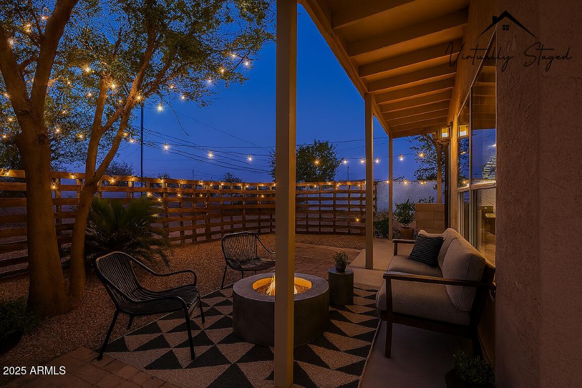 551 West Harding Avenue Coolidge, AZ 85128 - Photo 5 of 52 a view of balcony with chairs and a potted plant