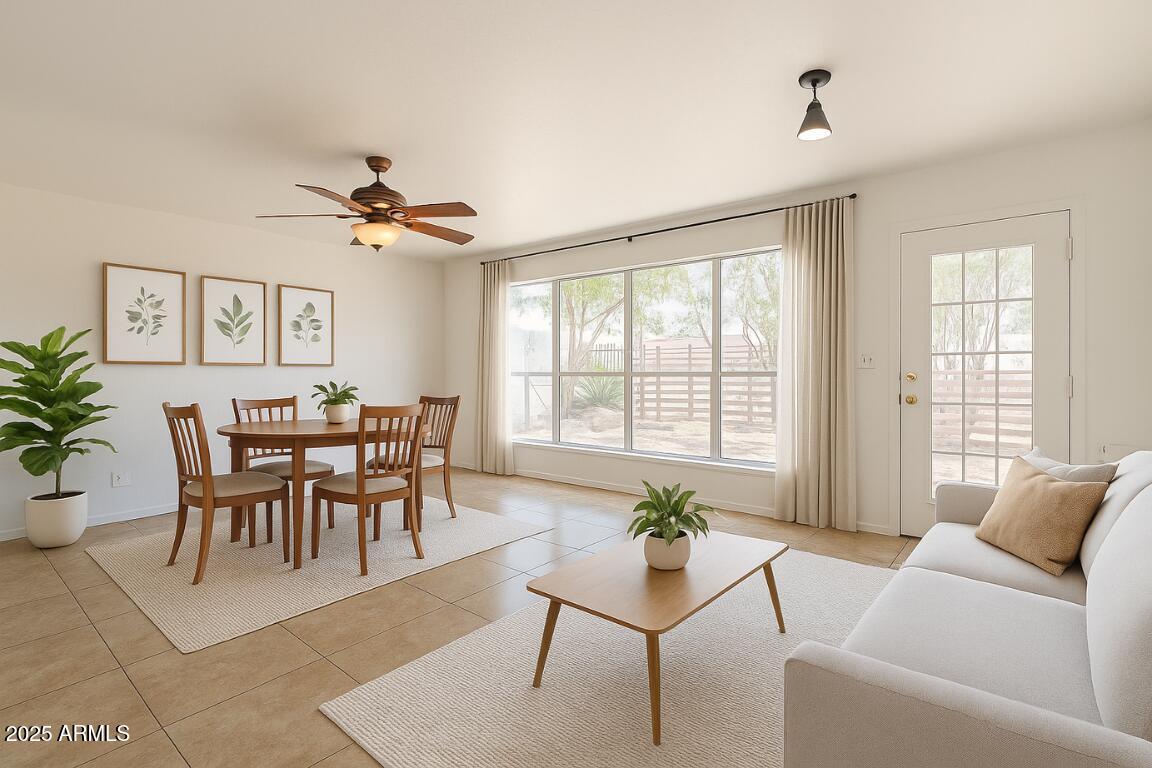 551 West Harding Avenue Coolidge, AZ 85128 - Photo 9 of 52 a view of a dining room with furniture window and wooden floor