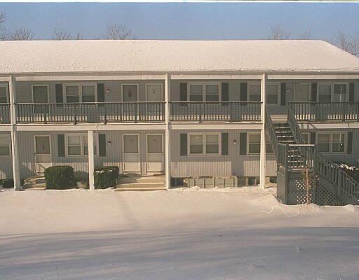 100 Pumpkin Hill Road, Unit 20 New Milford, CT 06776 - Photo 1 of 1 a view of building with a street