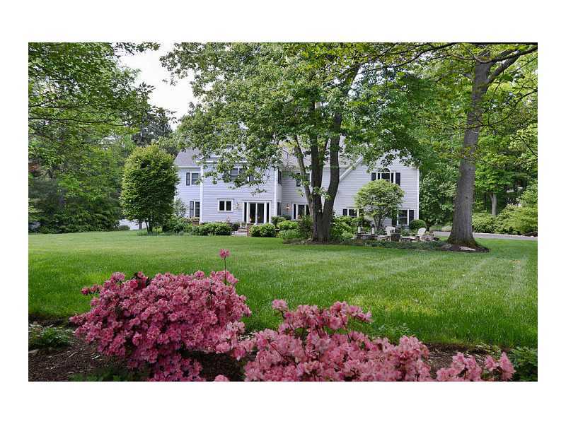 222 Marvin Ridge Road New Canaan, CT 06840 - Photo 23 of 25 a view of a garden with a fountain