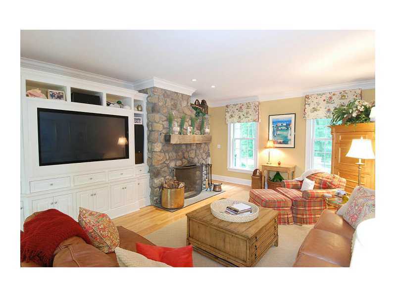 222 Marvin Ridge Road New Canaan, CT 06840 - Photo 8 of 25 a living room with furniture and a flat screen tv