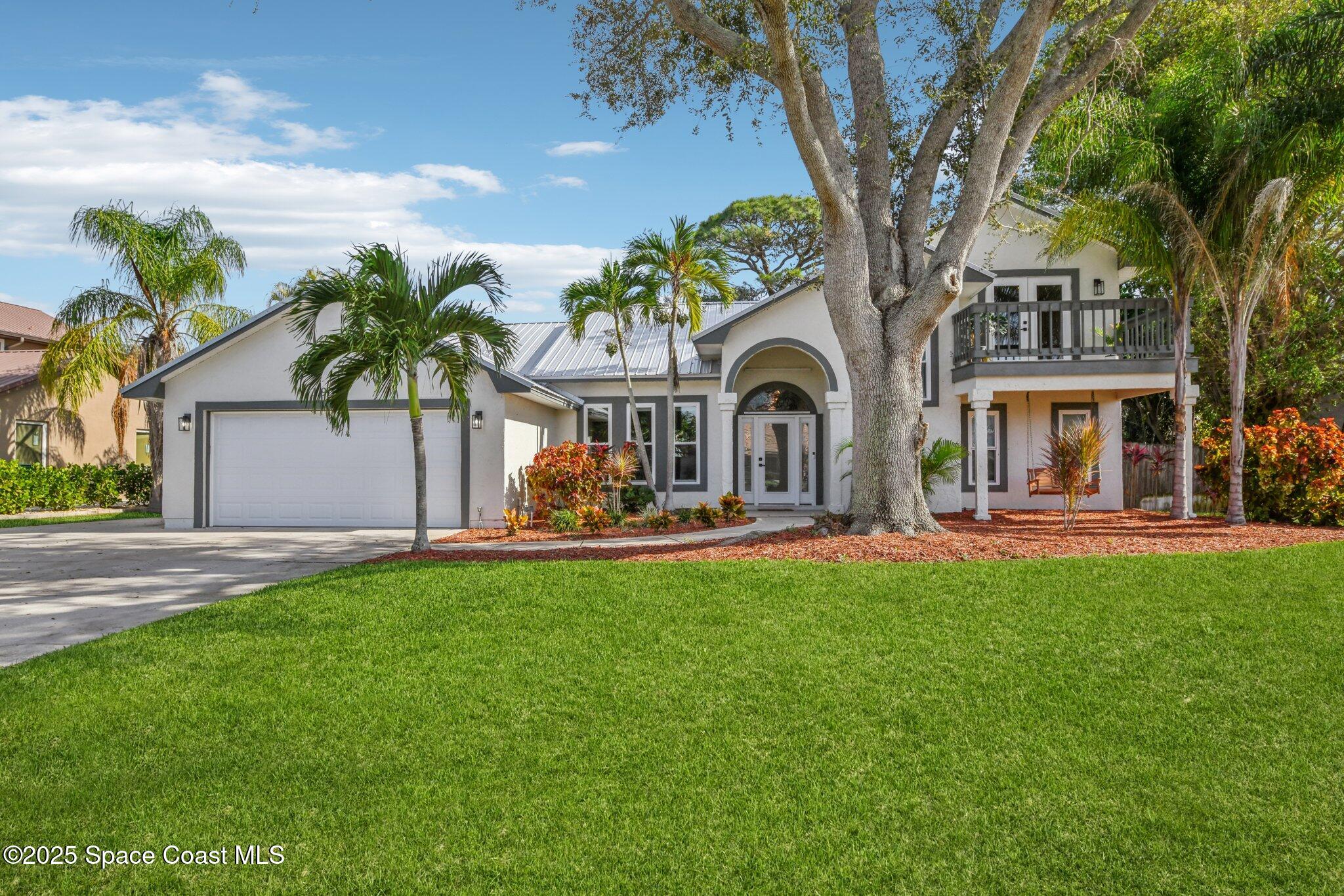 1935 Gates Road Merritt Island, FL 32952 - Photo 37 of 54 a front view of a house with swimming pool and porch with furniture