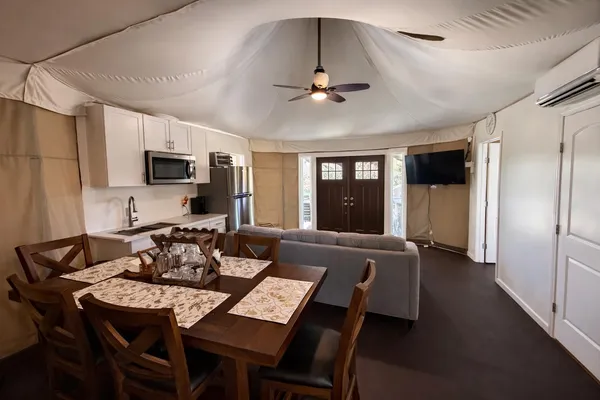 a view of a dining room with furniture