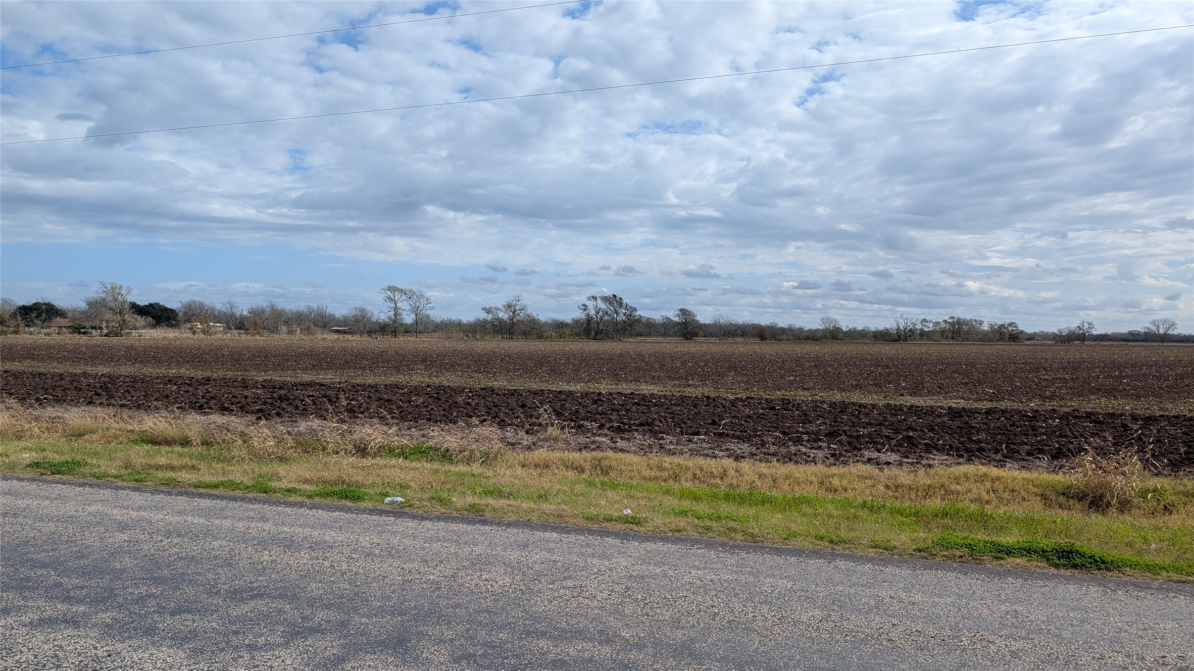 a view of a lake with a big yard