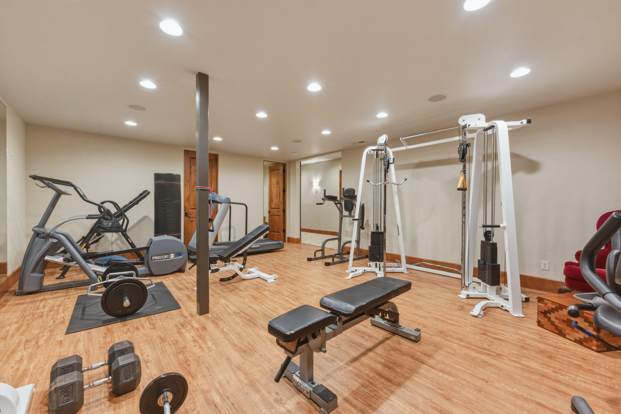 19100 Macalpine Loop Bend, OR 97702 - Photo 47 of 56 Lower level gym with half bath
