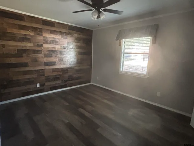 en empty room with windows