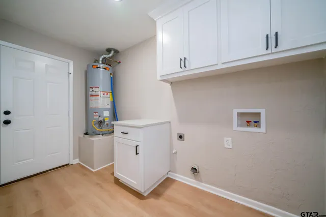 an empty room with cabinet