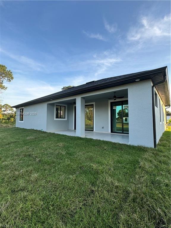 3414 4th Street Southwest Lehigh Acres, FL 33976 - Photo 28 of 28 a house view with a garden space