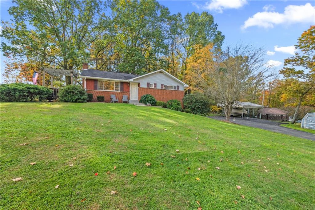 130 Hidden Hill Road Sarver, PA 16055 - Photo 31 of 36 a front view of a house with garden