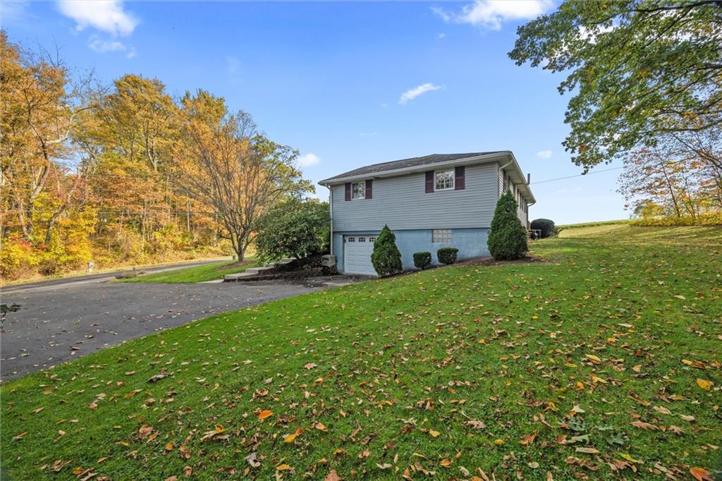 130 Hidden Hill Road Sarver, PA 16055 - Photo 35 of 36 a view of a house with a yard