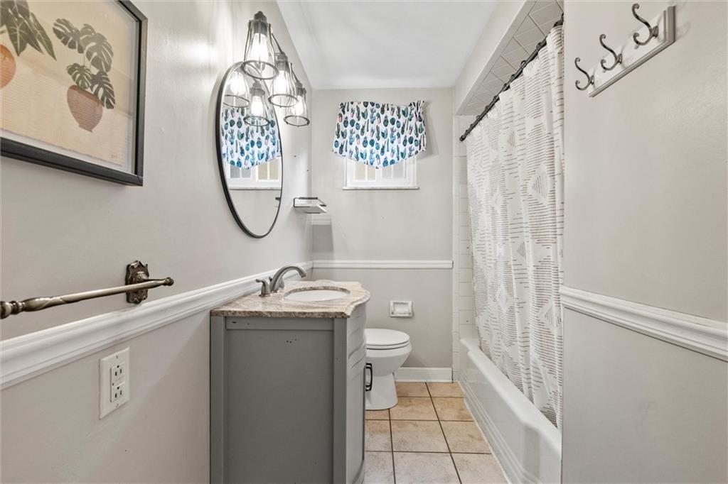130 Hidden Hill Road Sarver, PA 16055 - Photo 9 of 36 a bathroom with a sink a toilet and a mirror