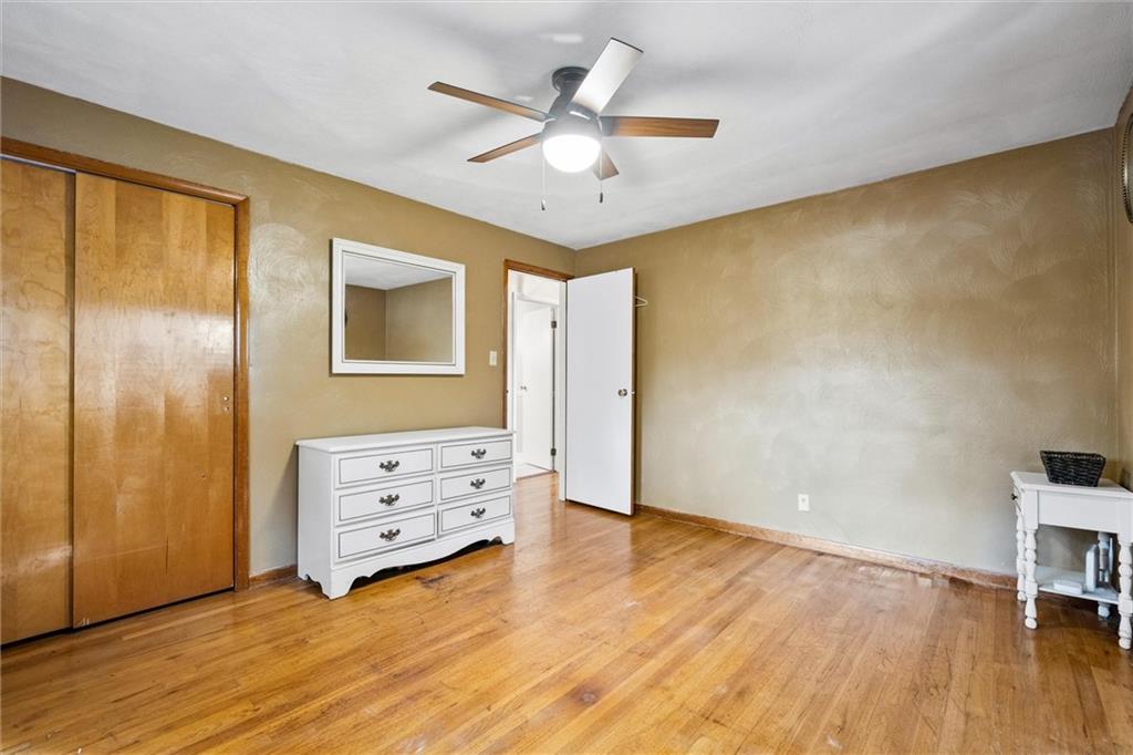 130 Hidden Hill Road Sarver, PA 16055 - Photo 10 of 36 a view of an empty room with a window and wooden floor