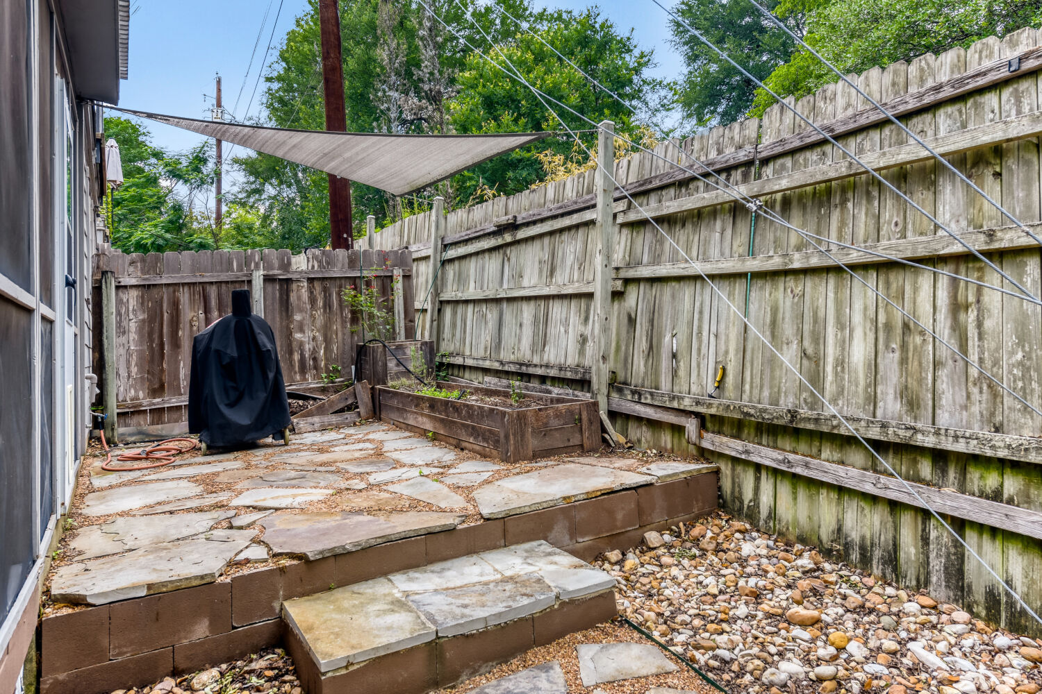 1912 Lightsey Road, Unit 6 Austin, TX 78704 - Photo 26 of 27 a view of a swimming pool with a patio and a garden