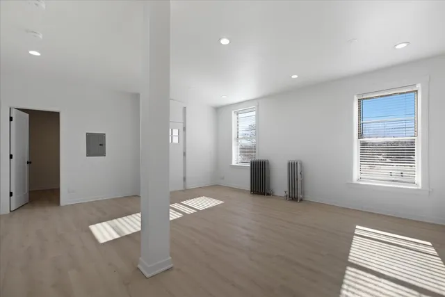 an empty room with windows