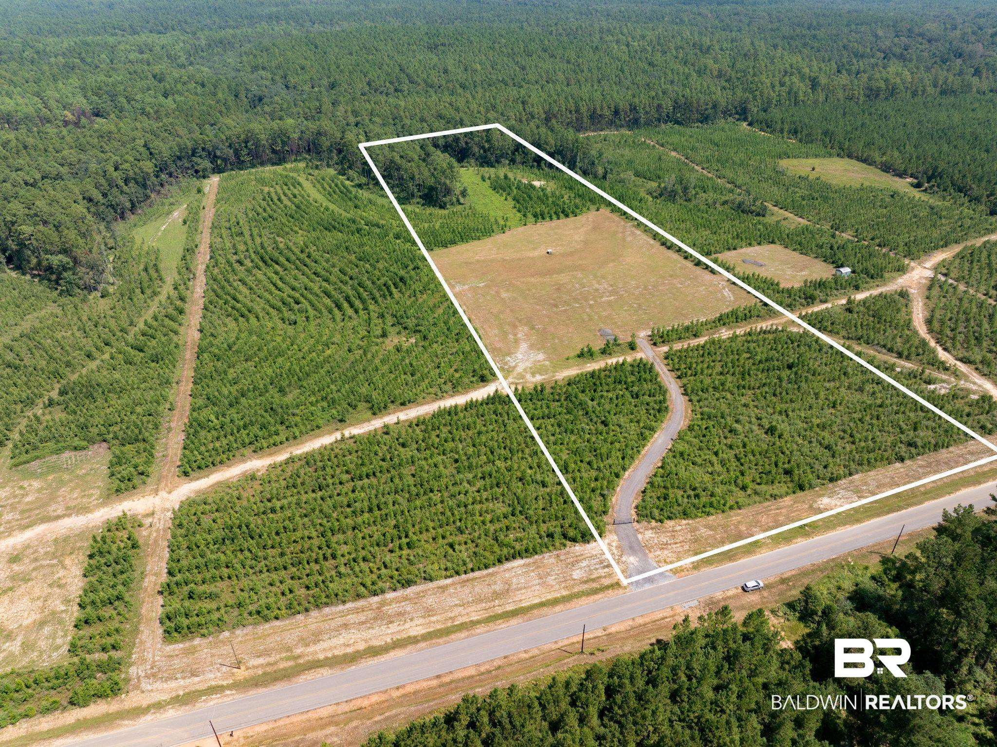 18813 Horseneck Road Bay Minette, AL 36507 - Photo 1 of 16 Drone / aerial view featuring a rural view
