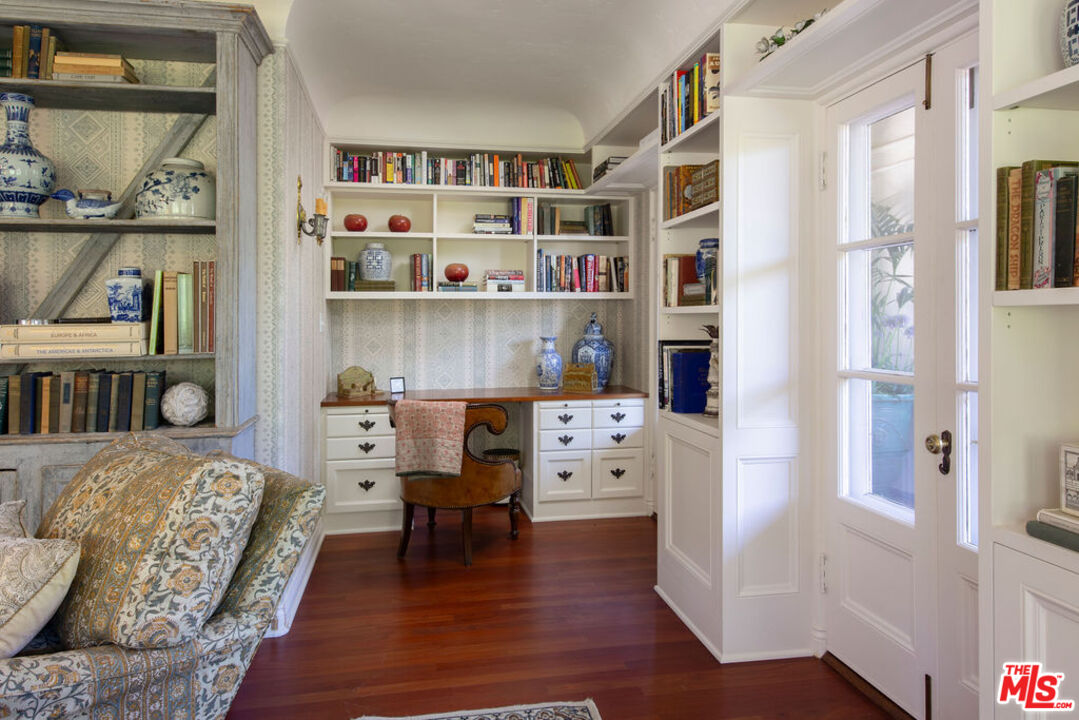 1640 Lombardy Road Pasadena, CA 91106 - Photo 11 of 39 a living room with furniture and a book shelf