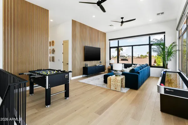 a bedroom with a bed and a table