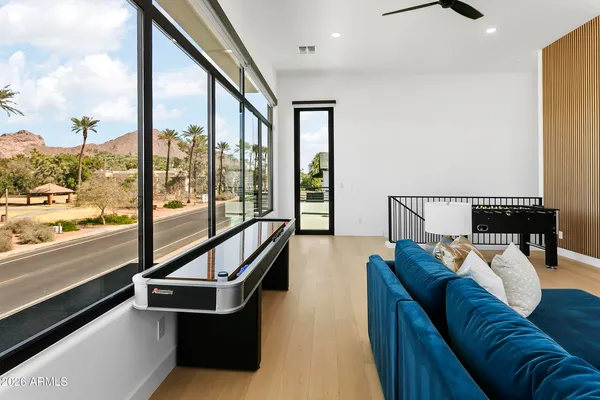 a bedroom with a bed and a lamp