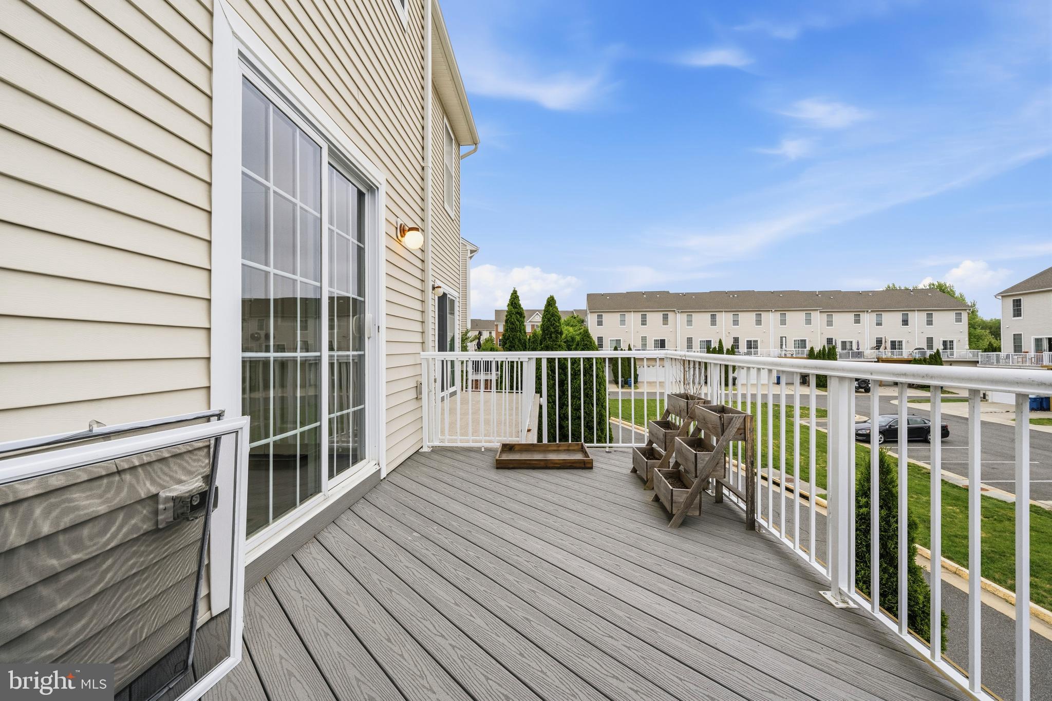 25154 Monteith Terrace Chantilly, VA 20152 - Photo 26 of 40 a view of a balcony with wooden floor