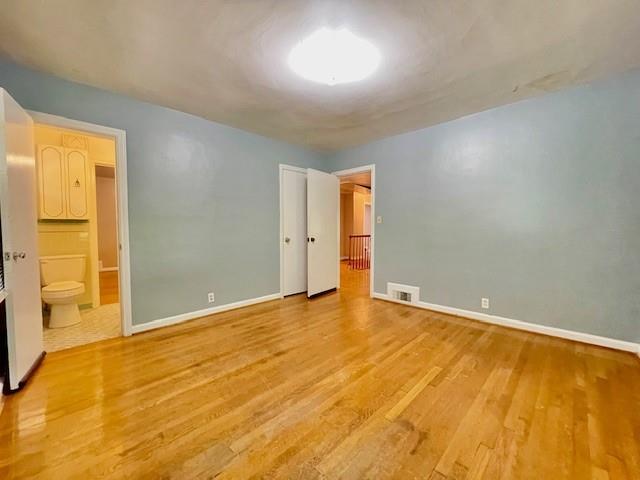 2396 Lavista Road Northeast Atlanta, GA 30329 - Photo 18 of 28 an empty room with a natural light