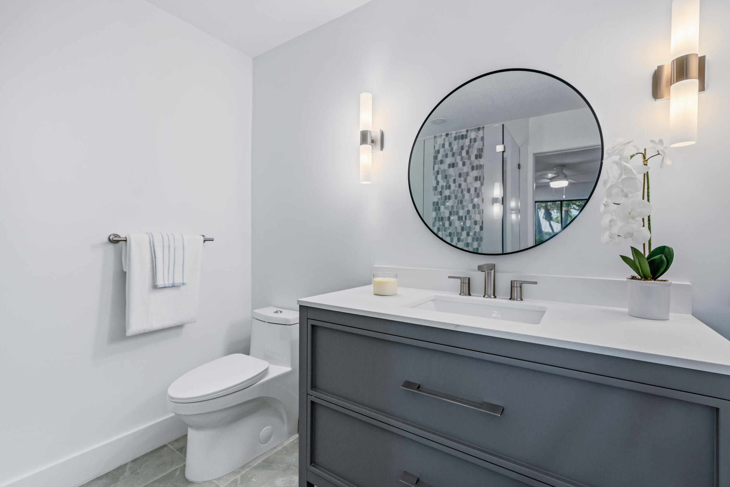 122 Sand Pine Drive Jupiter, FL 33477 - Photo 13 of 20 Downstairs Bathroom