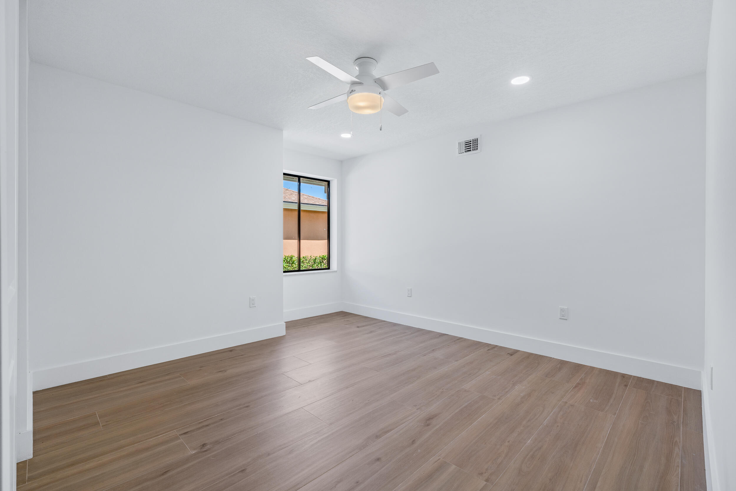 122 Sand Pine Drive Jupiter, FL 33477 - Photo 14 of 20 Downstairs Bedroom 2