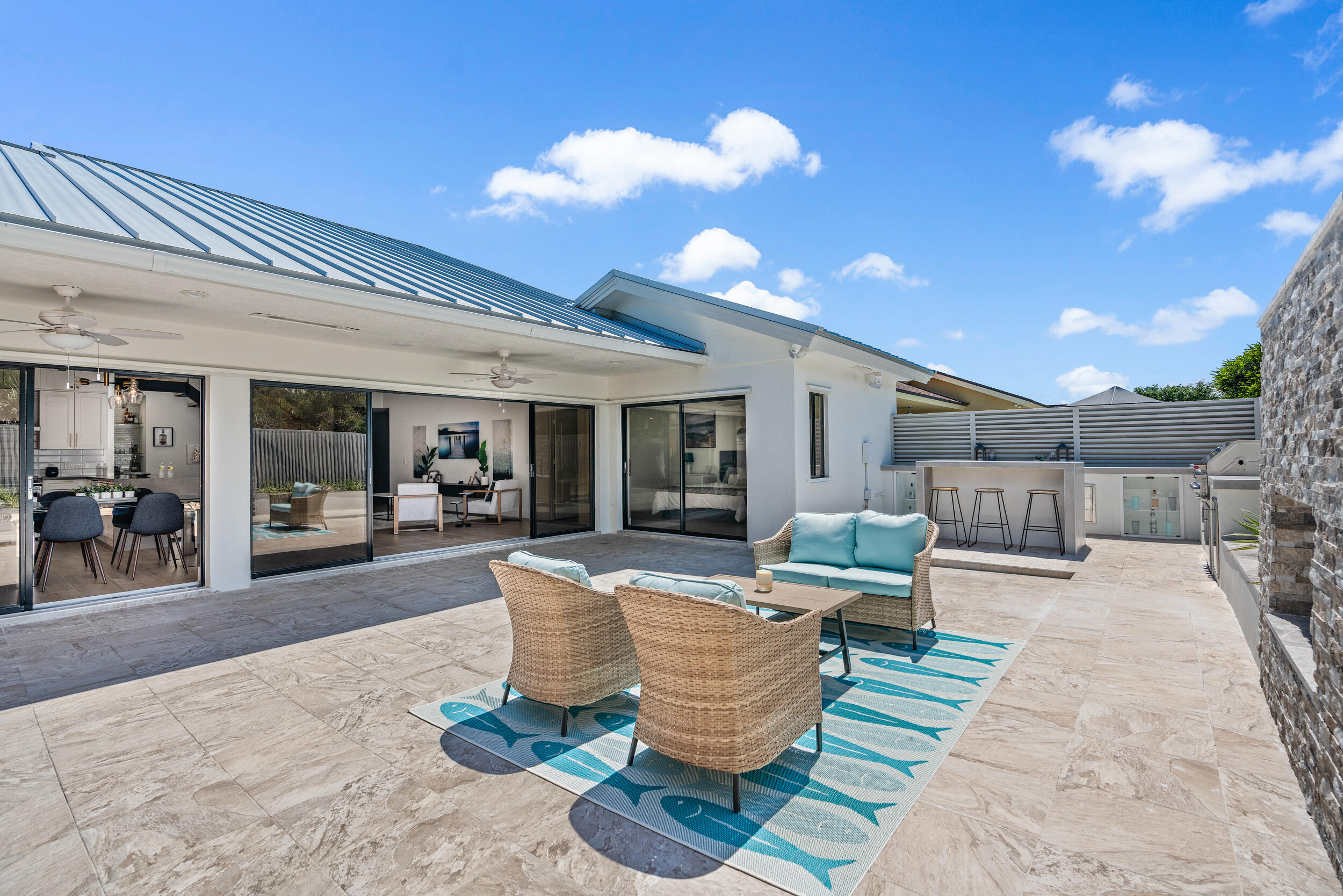 122 Sand Pine Drive Jupiter, FL 33477 - Photo 3 of 20 Patio Entertainment/Summer Kitchen