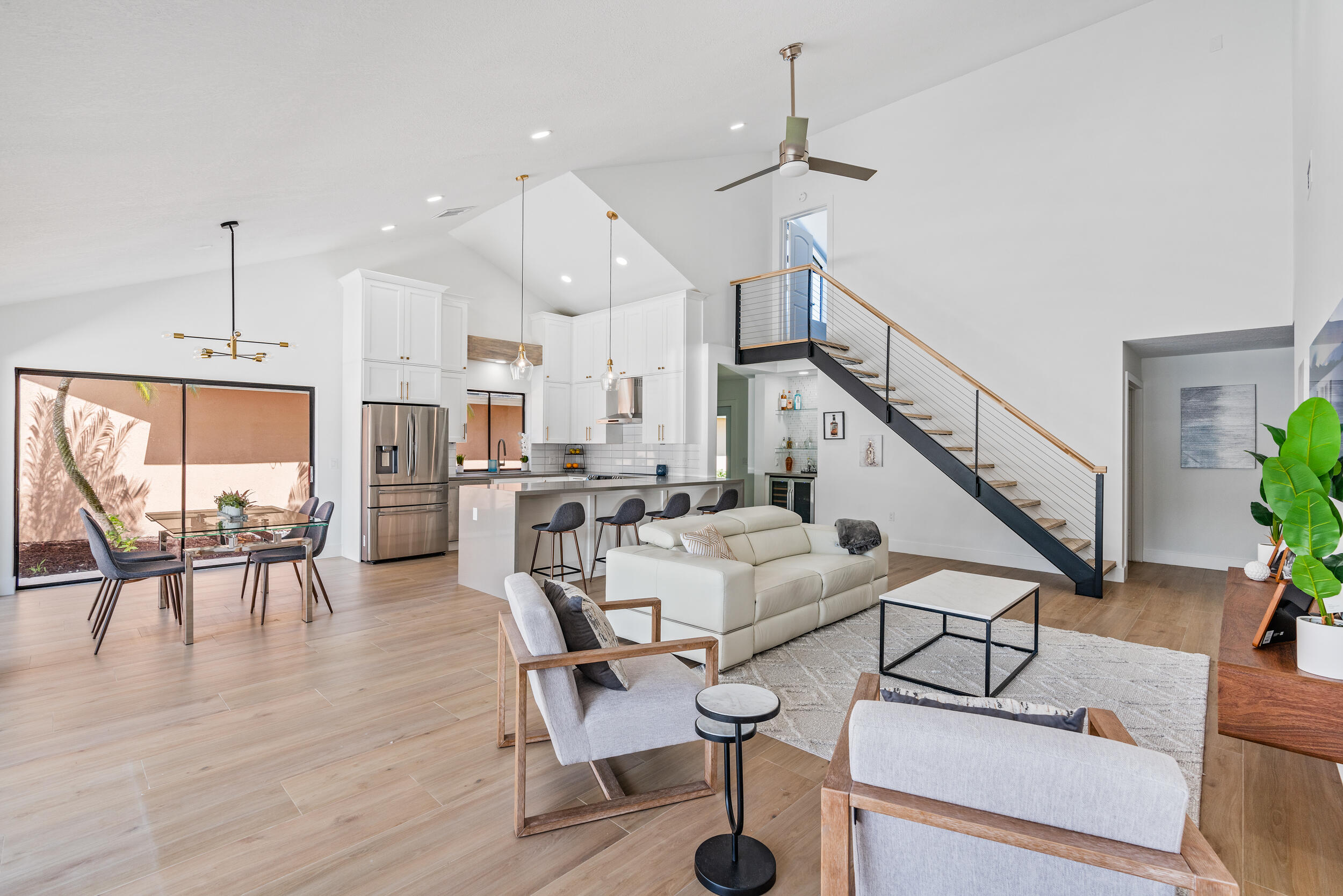 122 Sand Pine Drive Jupiter, FL 33477 - Photo 5 of 20 Family Room/Kitchen