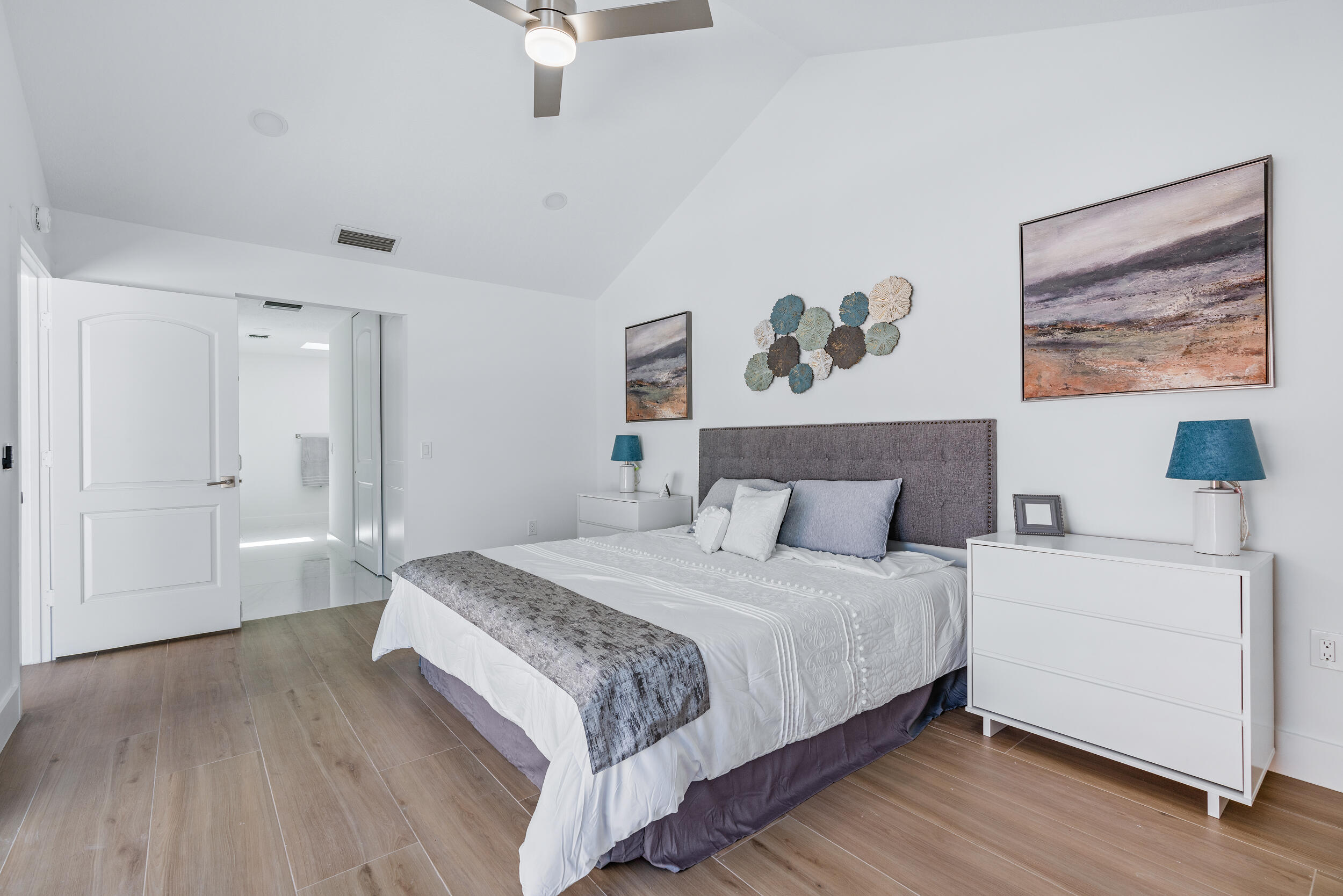 122 Sand Pine Drive Jupiter, FL 33477 - Photo 7 of 20 Downstairs Master Bedroom