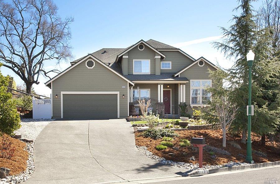 1479 Hawk Crest Place Santa Rosa, CA 95409 - Photo 1 of 1 a front view of a house with yard and trees