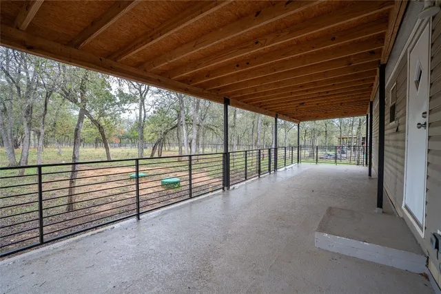 a view of outdoor space with wooden deck