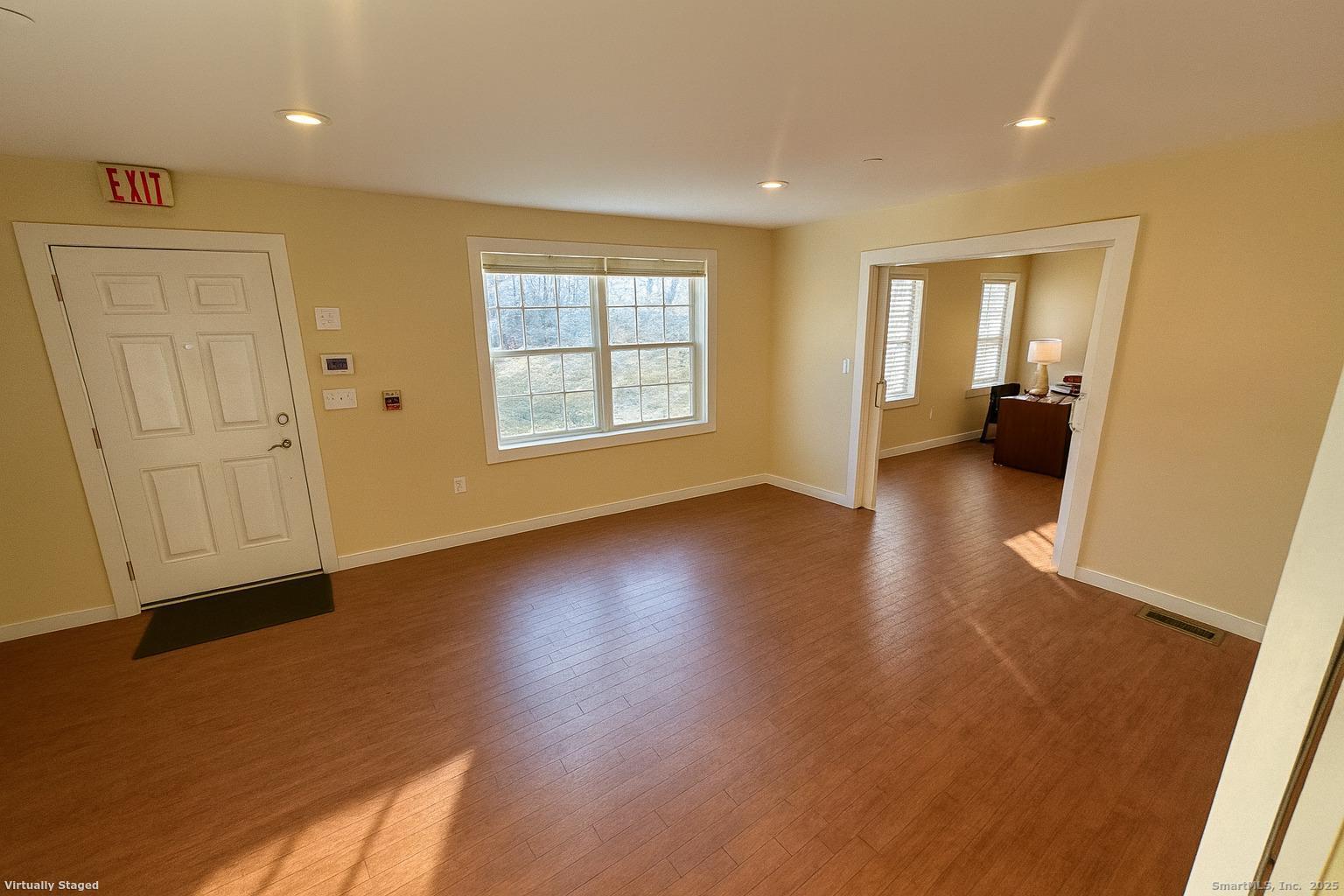 141 Valley Street New Haven, CT 06515 - Photo 14 of 30 an empty room with wooden floor and windows