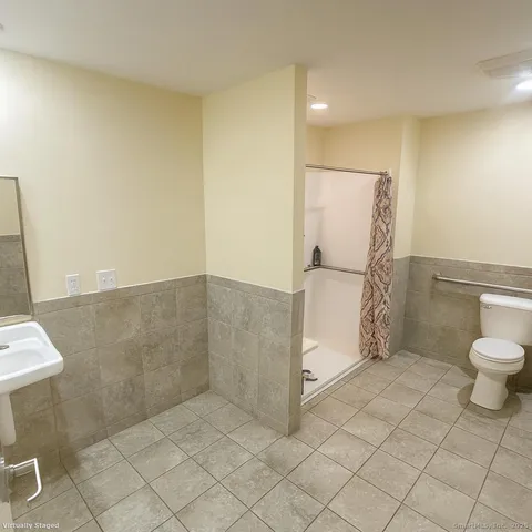 a bathroom with a sink and a toilet