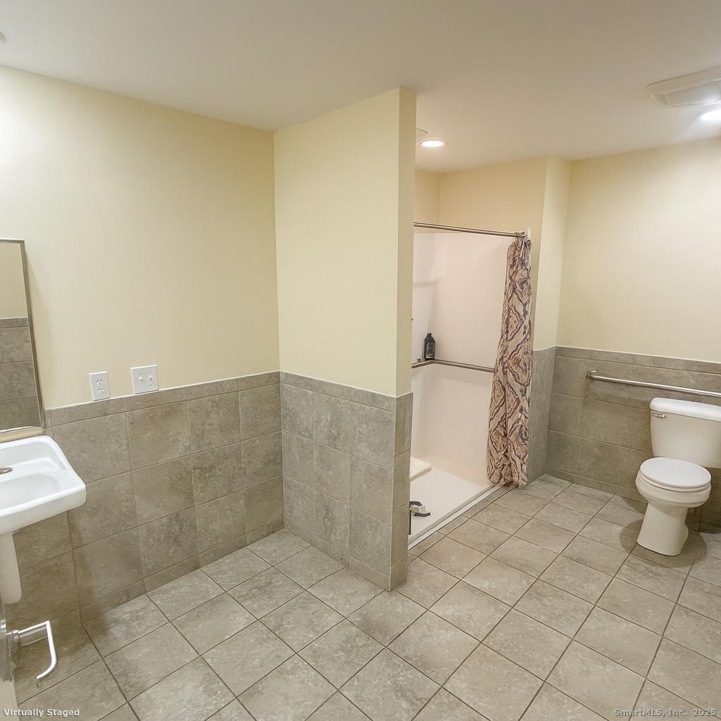 141 Valley Street New Haven, CT 06515 - Photo 16 of 30 a bathroom with a sink and a toilet