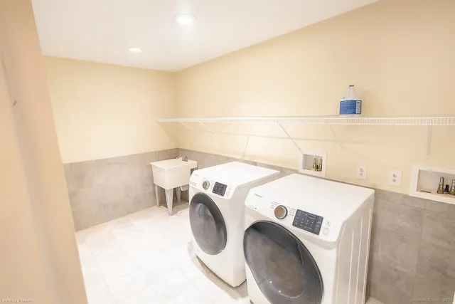 a utility room with dryer and washer