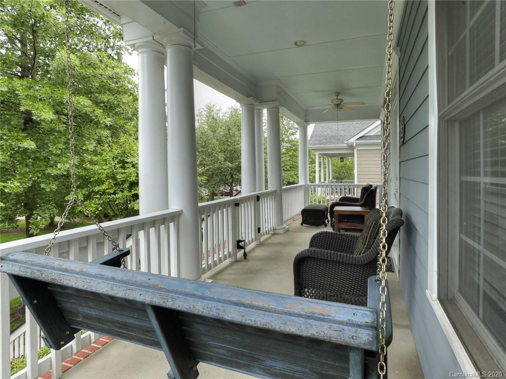 899 Stratford Run Drive Fort Mill, SC 29708 - Photo 2 of 48 a balcony with furniture and a potted plant