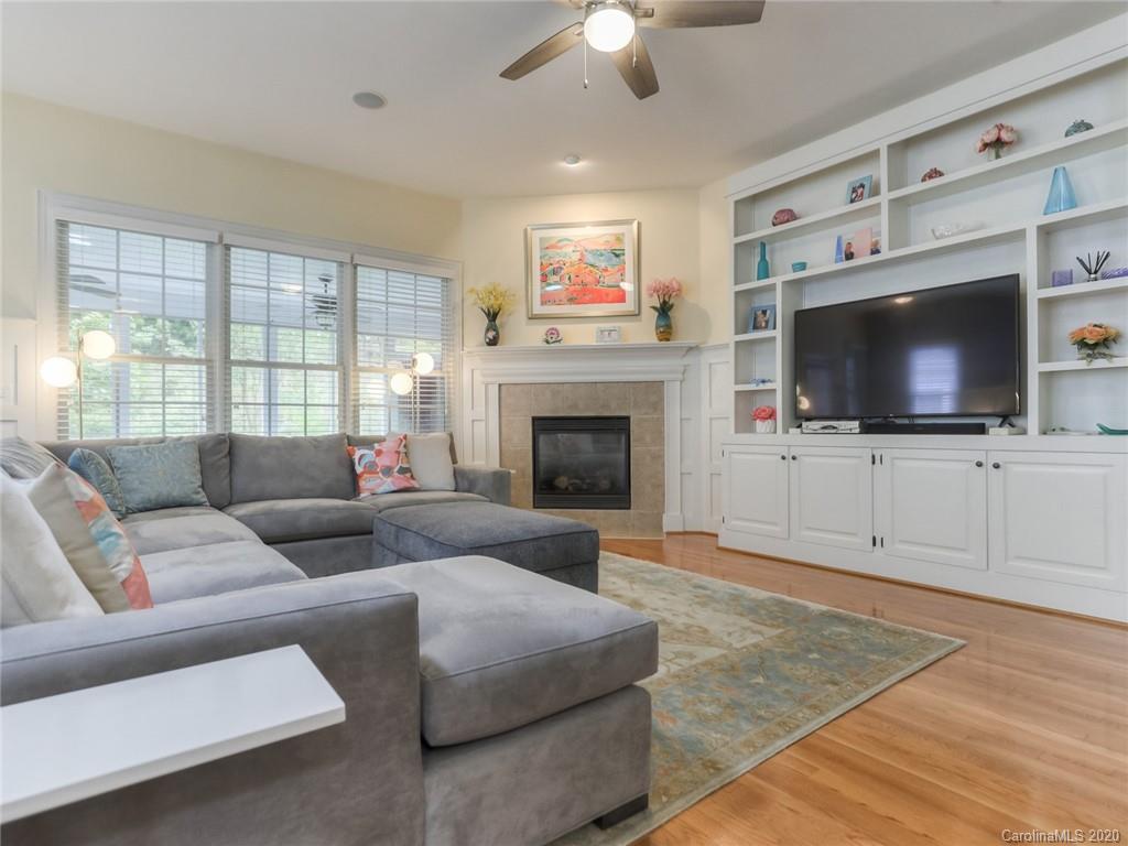 899 Stratford Run Drive Fort Mill, SC 29708 - Photo 20 of 48 a living room with furniture and a flat screen tv
